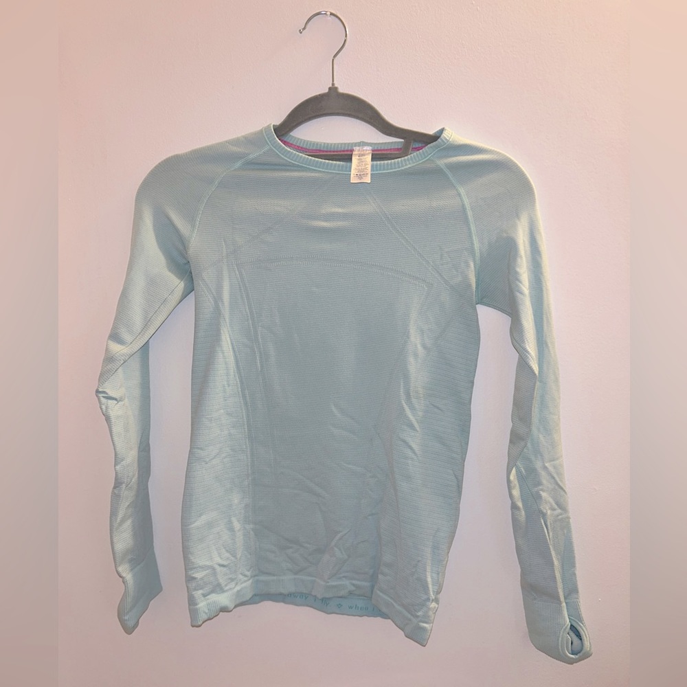 Ivviva light blue long sleeve athletic shirt size 12 no stains